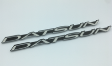 Load image into Gallery viewer, Genuine OEM Datsun 240Z Fender &#39;DATSUN&#39; Emblem Set of 2