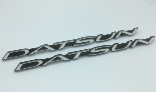 Genuine OEM Datsun 240Z Fender 'DATSUN' Emblem Set of 2